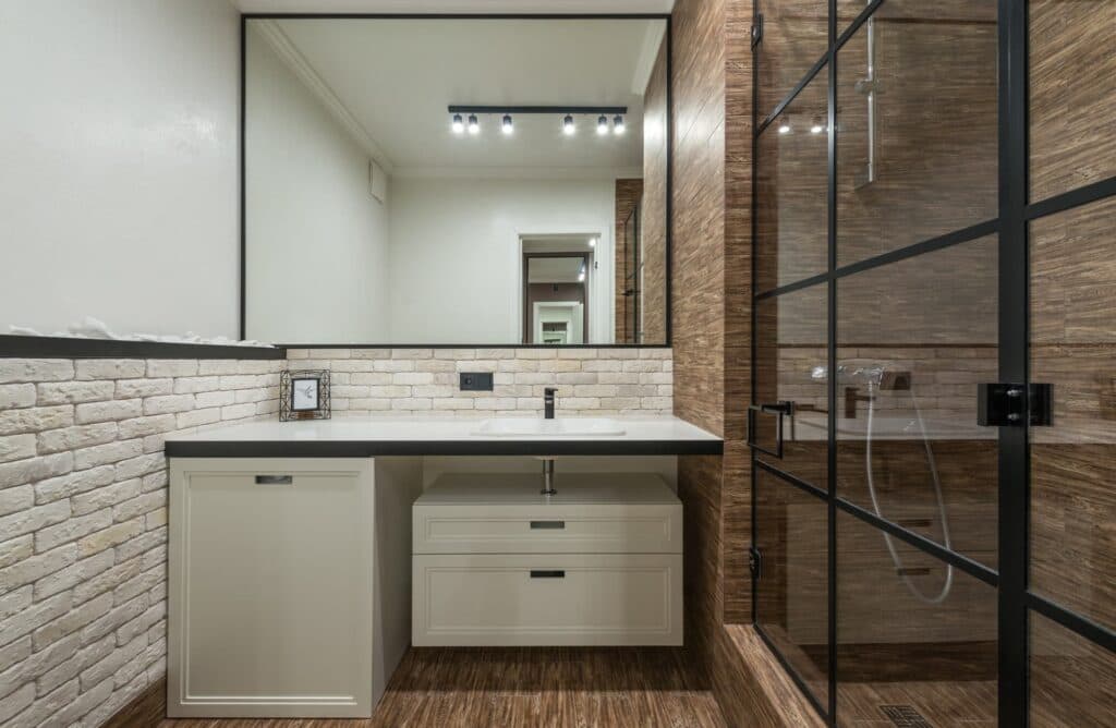 custom shower unit glass wall and door with metal framing