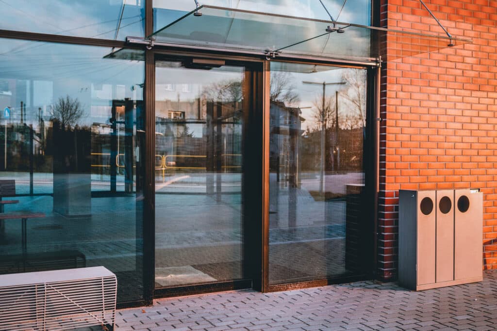 storefront glass door with glass wall
