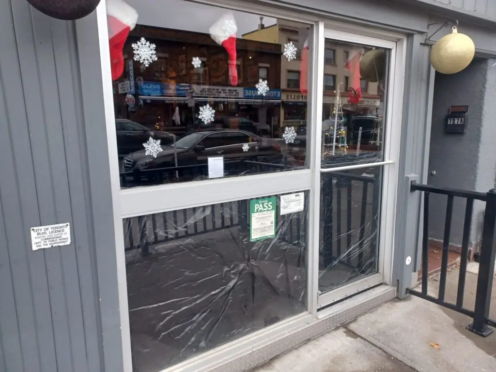 Commercial storefront glass and aluminum entrance system