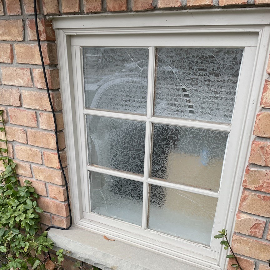 Broken decorative glass panel prepared for replacement