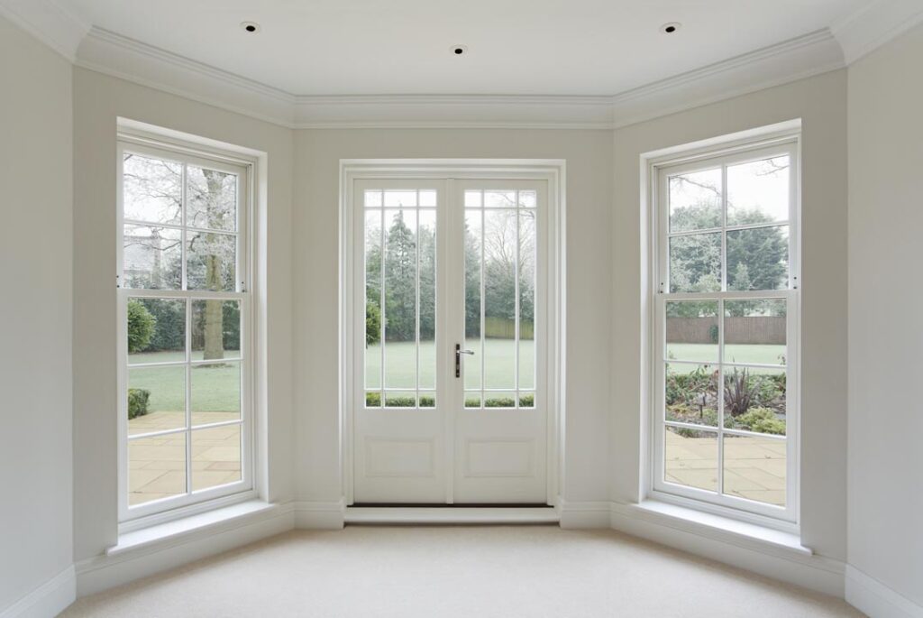 white indoor with glass door and glass windows