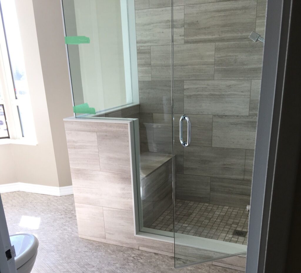 custom cut shower unit glass wall and door