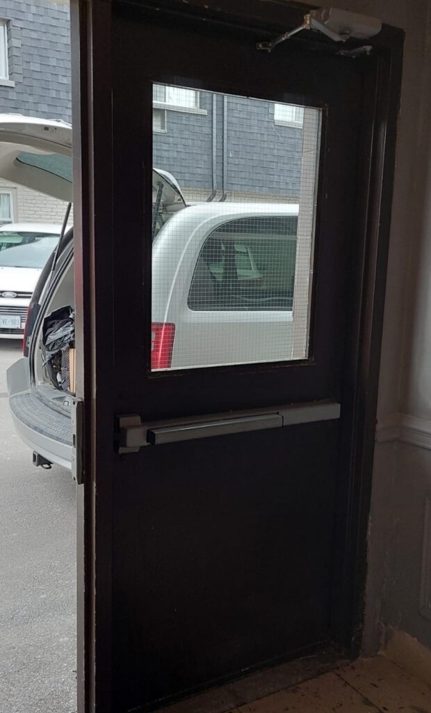 fire rated door and white car