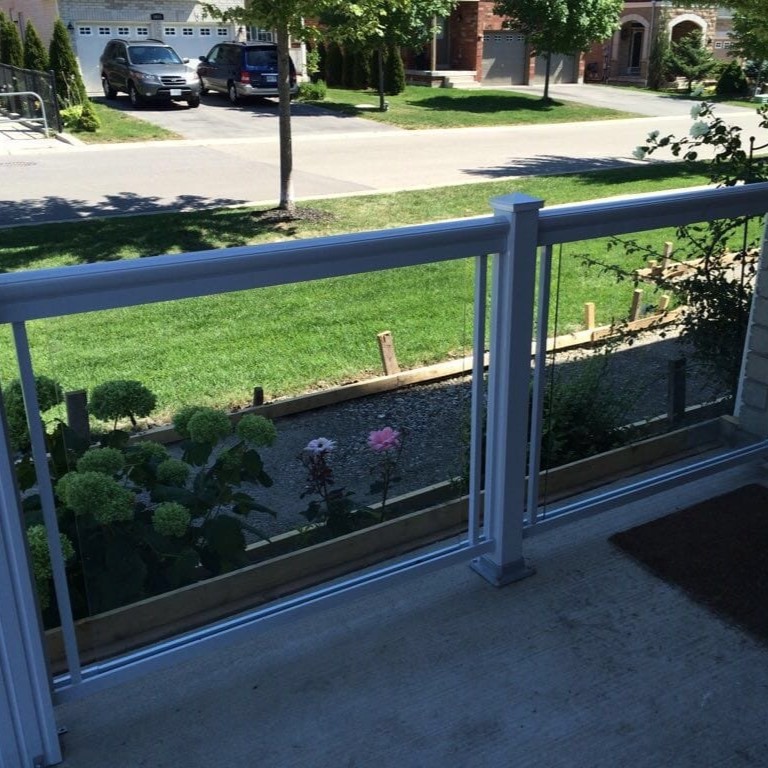 residential glass railing with wooden and steel frame