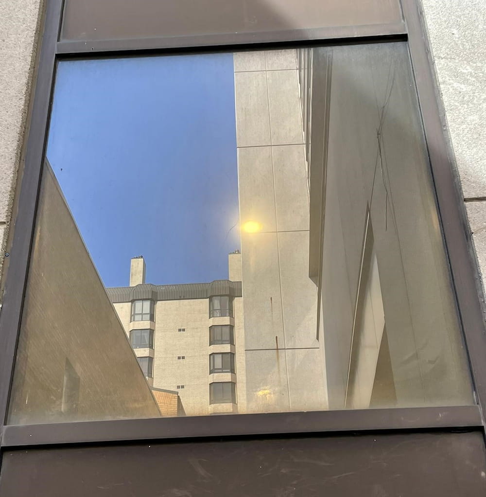 apartment building with tinting glass window 